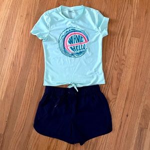 Girl’s old navy girl’s two piece swimsuit. Swim shorts and t shirt.